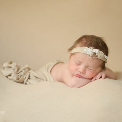 Newborn baby posed with cream wrap Tickle Toes Newborn baby photography Dublin Meath Kildare Wicklow